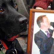 Hearing dog Cameron, who met David Cameron