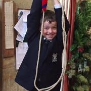 Ethan Barter in action ringing the bells at St Giles