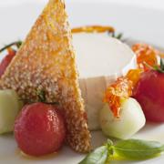Goats' cheese salad with cherry tomatoes and sesame brittle