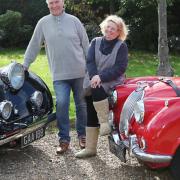 Brian Dodd and wife, Veronica, and their converted 1947 MKIV 3.5 ltr Jaguar (black) and 4.2ltr XK120 (red)