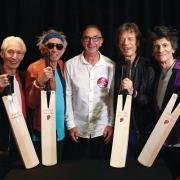 One of David's proudest moments was presenting the Rolling Stones with commemorative cricket bats backstage at a gig at Old Trafford