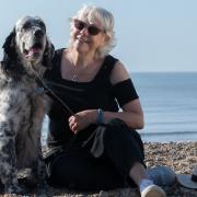 Jan Etherington with her dog Jagger on Walberswick beach Picture: SARAH LUCY BROWN