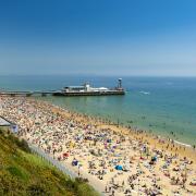 Sunbathers pack Bournemouth beach near the Pier. Photo allou, Getty Images/iStockphoto
