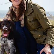 Jess French at Winterton beach with her dog Baxter