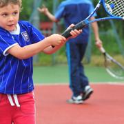A young player tries his hand with a racket at last year's Great British Tennis Weekend at Beccles Tennis club