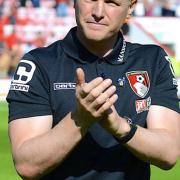 AFC Bournemouth's Eddie Howe salutes the home fans after the Bournemouth v Aston Villa. (Photo by Sophie Cook)