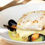 Hake and creamed potatoes with curried mussel sauce
