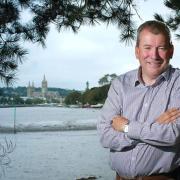 Malcolm Bell - Head of Tourism (Truro) With Truro Cathedral in the back ground