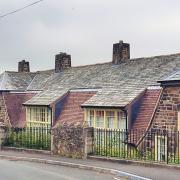 An old school in the Peak District, now converted into houses