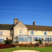 Horsley Lodge in its attractive setting with surrounding golf course
