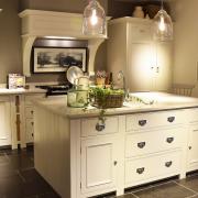 Neptune Chichester Kitchen with Lyra quartz worktop, Aga Total Control range cooker finished in Pearl Ashes, Shaftsbury pendant lighting, Wardley barstools, Accessories By Neptune By Hunters