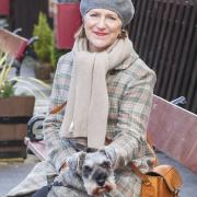 Charlotte and her beloved dog Bob, a canine therapist with a sideline in furniture demolition
