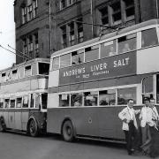 Tower Ramparts school - now demolished - towers above these trolleybuses at Electric House terminus in July 1949. The crew wear their summer jackets.