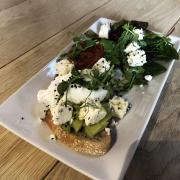 Smashed avocado on sourdough toast and plenty of feta cheese at Back to the Garden