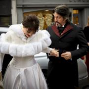 Hermione arrives at the church with father Laurence Llewelyn-Bowen