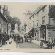 High Street in Swanage looking towards George Burt's Purbeck House, where he lived with his wife and six children, and the Town Hall of 1881 (once five cottages)