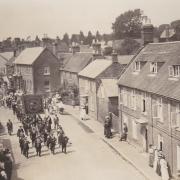 To celebrate and mark the end of the First World War a national Bank Holiday called Peace Day was held on July 19, 1919. Here a band and members of the local Oddfellows lead the procession through Cranborne