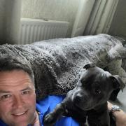Michael Owen and Staffy Kaiser, who he tries to teach good manners