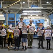 Nick Goldsmith with the after-school newspaper club The Vault visiting the printers  to see the first issue of their quarterly subscription based newspaper What's Going On? Mattie, Sara, Austyn, Niamh, Phoebe, Tally, Tom, Alice and Daniel