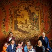 Albion (six), Drew Marriott, LLB, Romilly (six months) with mother Hermione Marriott, Cecile with daughter Demelza (15 months), Jackie Llewelyn-Bowen, and Dan Rajan in The Music Room at Cirencester Park