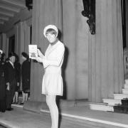 Mary Quant accepting her OBE in a mini skirt in 1966.
