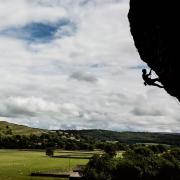 The cliff, known as Kilnsey Crag, is a popular tourist spot in Wharfedale, North Yorkshire, and has