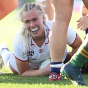 Rosie Galligan of England scores a try against South Africa in the 2022 World Cup  . (Photo by : Fiona Goodall – World Rugby via Getty Images)