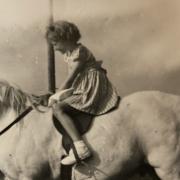 Christine, aged around seven, riding Snowy, which belonged to a friend of her auntie and uncle.