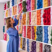 The colourful wall of wool. Photo: Chloe Upton Studio