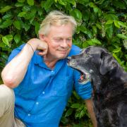 Martin Clunes with his adopted guide dog Laura who features in a new television documentary