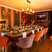 The dining room is decorated in the rich coppers, golds and russets of an autumnal New Forest. Image: Liam Upshall (c) Liam Upshall