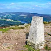Trig points, such as here at Win Hill, are a welcome sight for walkers