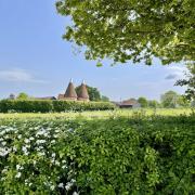 An oast, oast house or hop kiln is a building designed for kilning (drying) hops as part of the brewing process. (c) Anne Talbot/iStock/ Getty Images Plus