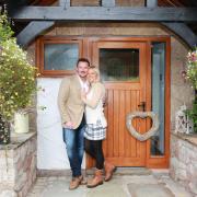 Russell and Louise Watson outside their home in Cheshire