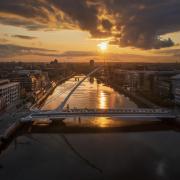 River Liffey, Dublin, aerial view of Samuel Beckett Bridge.