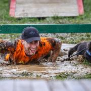 It's a case of mud, sweat and cheers when you take part in the Muddy Dog Das at Upton Park in Poole.