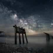 Galactic Bay by Giles Embleton-Smith which was the winner of the Starry Skyscapes category in the South Downs National Park astrophotography competition.