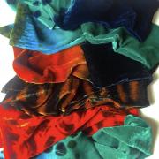 A selection of Jenny's richly-coloured velvet scarves.