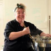 Candi Robertson creating her chutneys and sauces for her business, Candi's Cupboard.