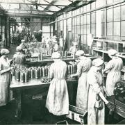 Female munition workers making shells