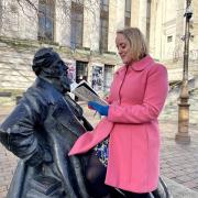 Lucinda reads Oliver Twist to her great-great-great grandfather
