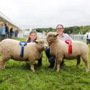 Amelie and Jenny Maguire with their prize sheep