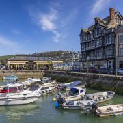 Boats moored in the lovely little square inner harbour at Dartmouth