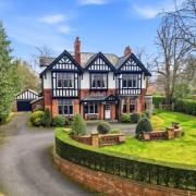 Period house with patterned brickwork, timber detailing and driveway