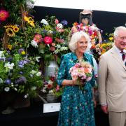 Queen Camilla and King Charles at a previous Sandringham Flower Show.