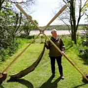Gail McGarva in Galloway House Gardens, Garlieston, Dumfries and Galloway, with wood she will use for a live boatmaking event at Spring Fling (and a set of oars).