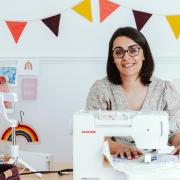 Sophie at her sewing machine.