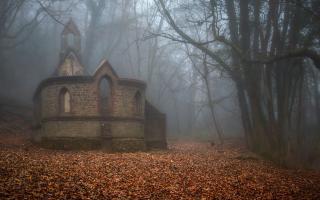 Mist gathers around the abandoned ruins of Bedham Church in Bedham, West Sussex