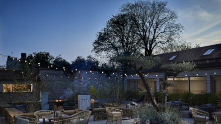 The courtyard at The Harper, lit up by twinkling fairylights. Photo: contributed by Rove PR