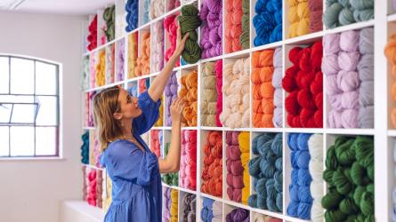 The colourful wall of wool. Photo: Chloe Upton Studio